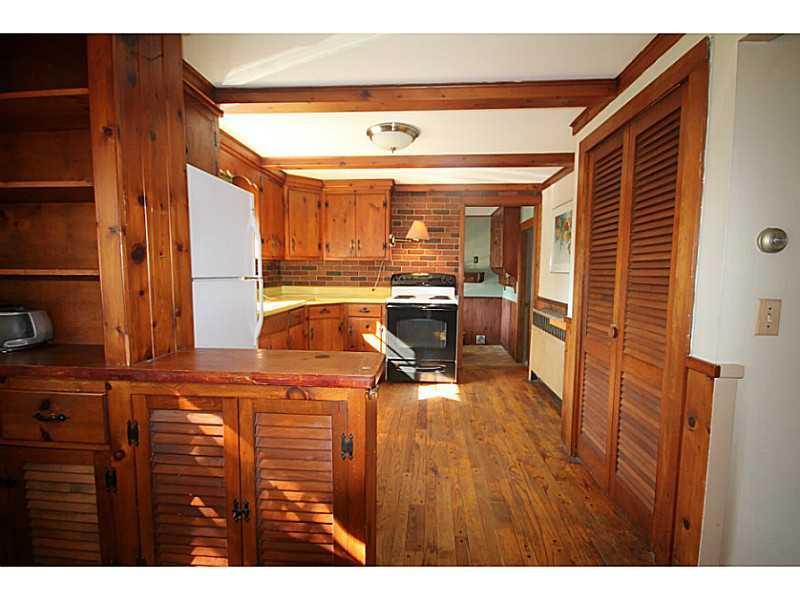 25 Montgomery Road Boothbay Harbor, ME 04538 - Photo 11 of 26 Kitchen. The kitchen, with pine...