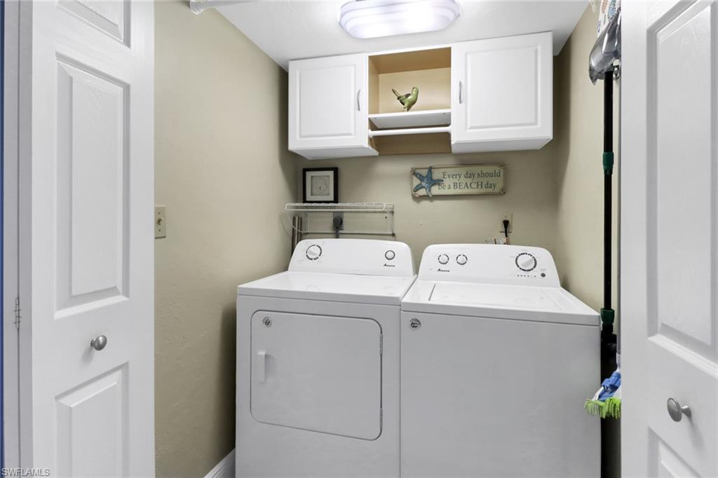 305 Goodlette Road South, Unit C302 Naples, FL 34102 - Photo 15 of 22 a utility room with dryer and washer