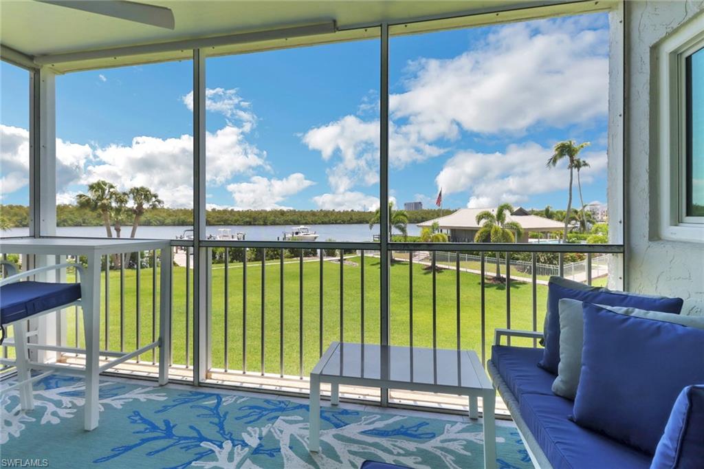 305 Goodlette Road South, Unit C302 Naples, FL 34102 - Photo 16 of 22 a view of a city from a balcony
