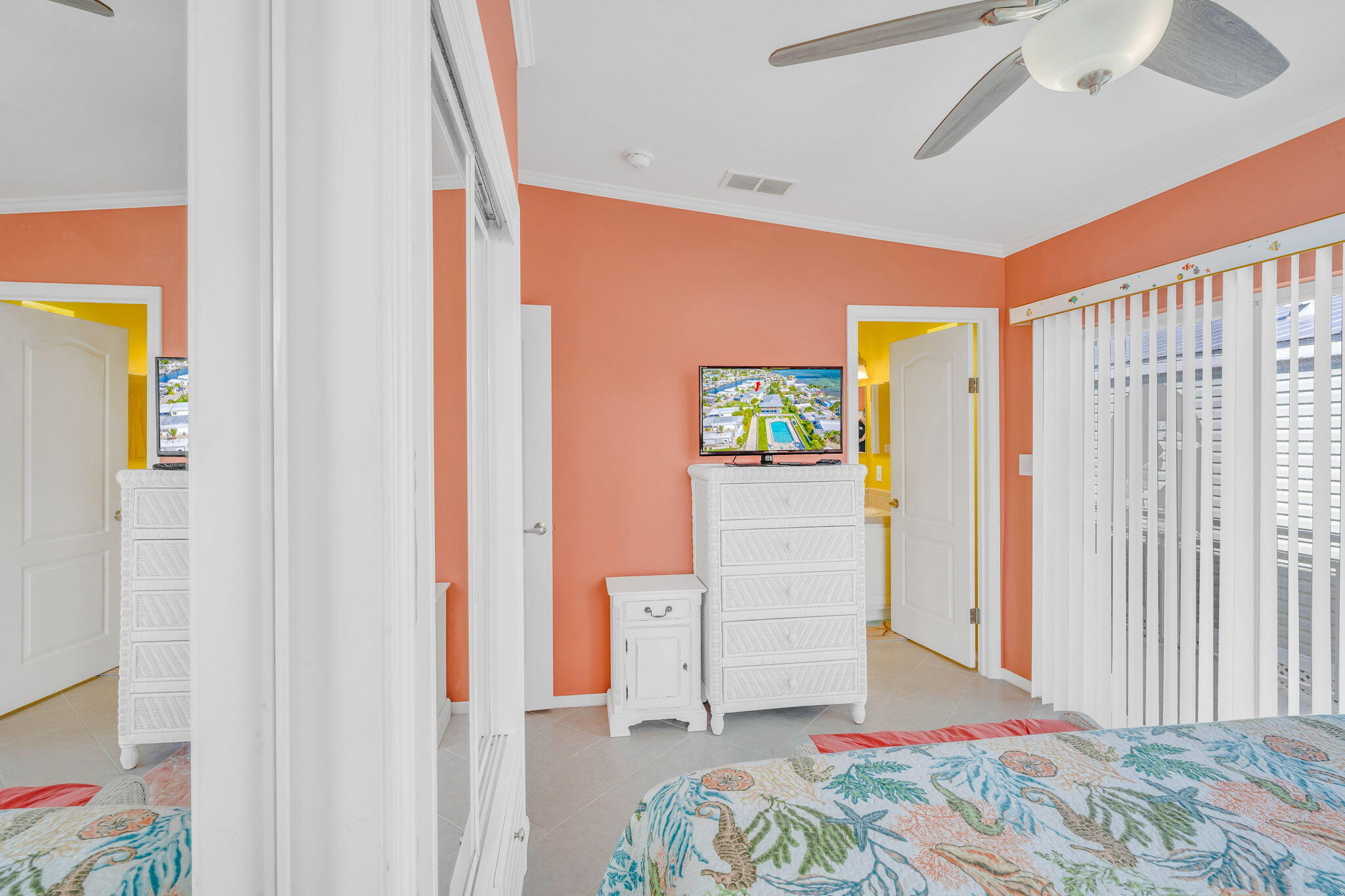 55 Boca Chica Road, Unit 447 Key West, FL 33040 - Photo 8 of 51 a bedroom with a bed and a window