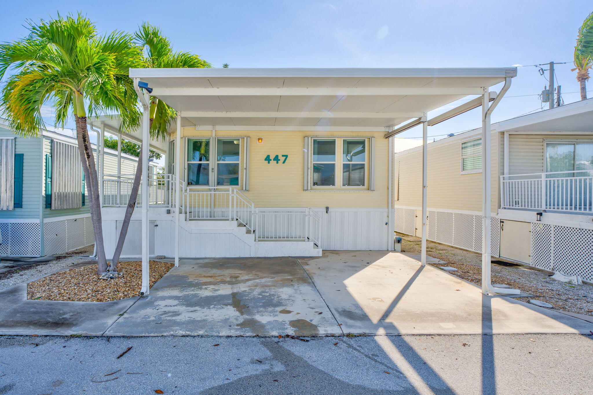 55 Boca Chica Road, Unit 447 Key West, FL 33040 - Photo 19 of 51 a front view of a house with garden