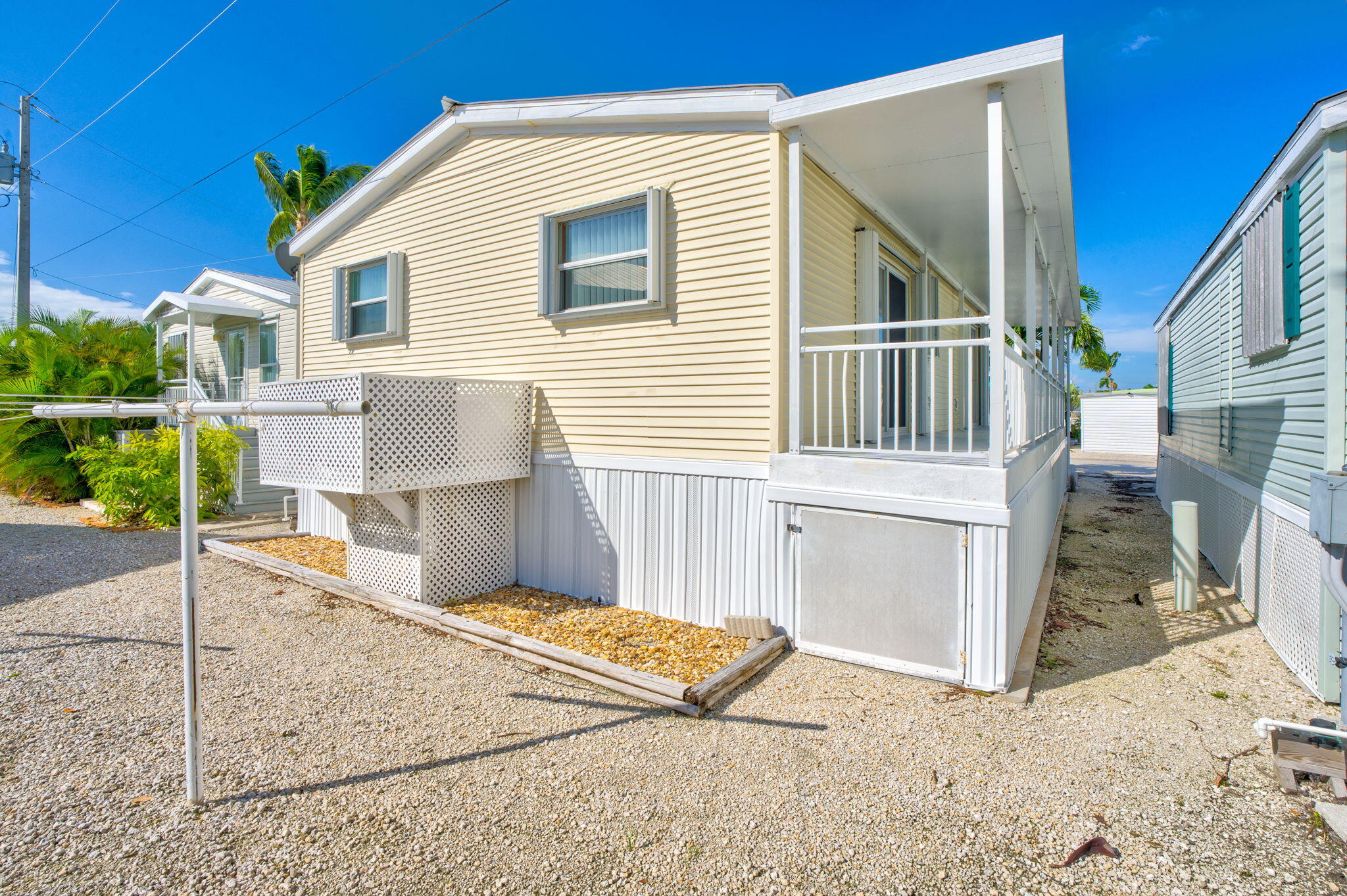 55 Boca Chica Road, Unit 447 Key West, FL 33040 - Photo 20 of 51 a view of a house with a small backyard