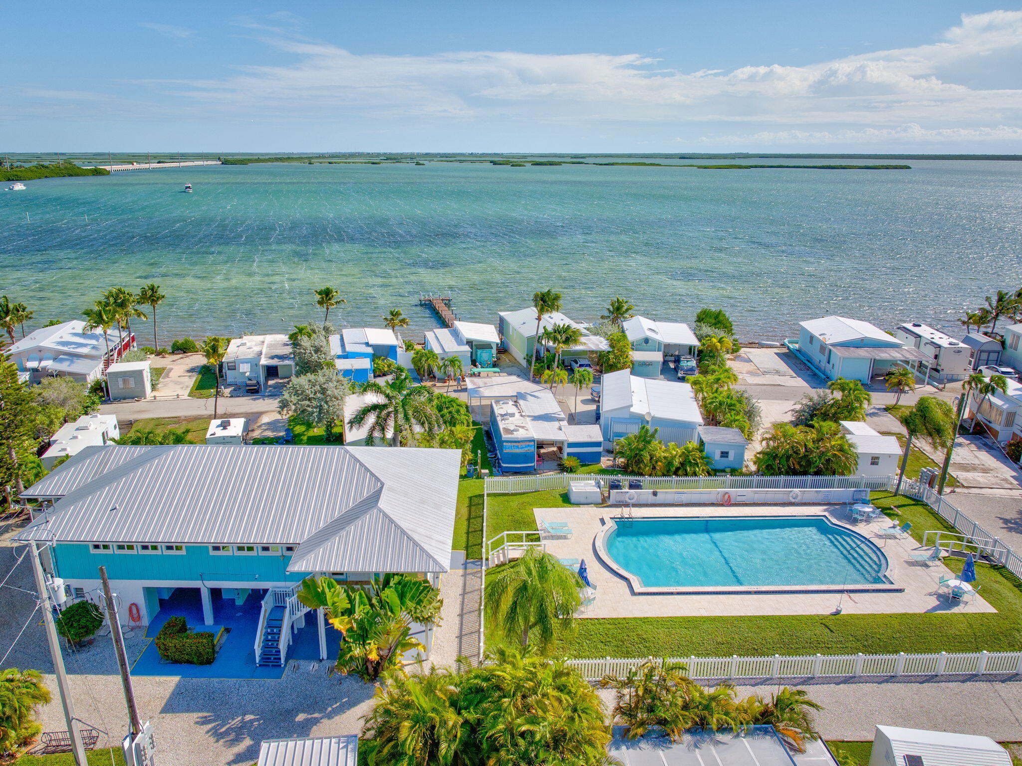 55 Boca Chica Road, Unit 447 Key West, FL 33040 - Photo 29 of 51 a view of yard with swimming pool and seating