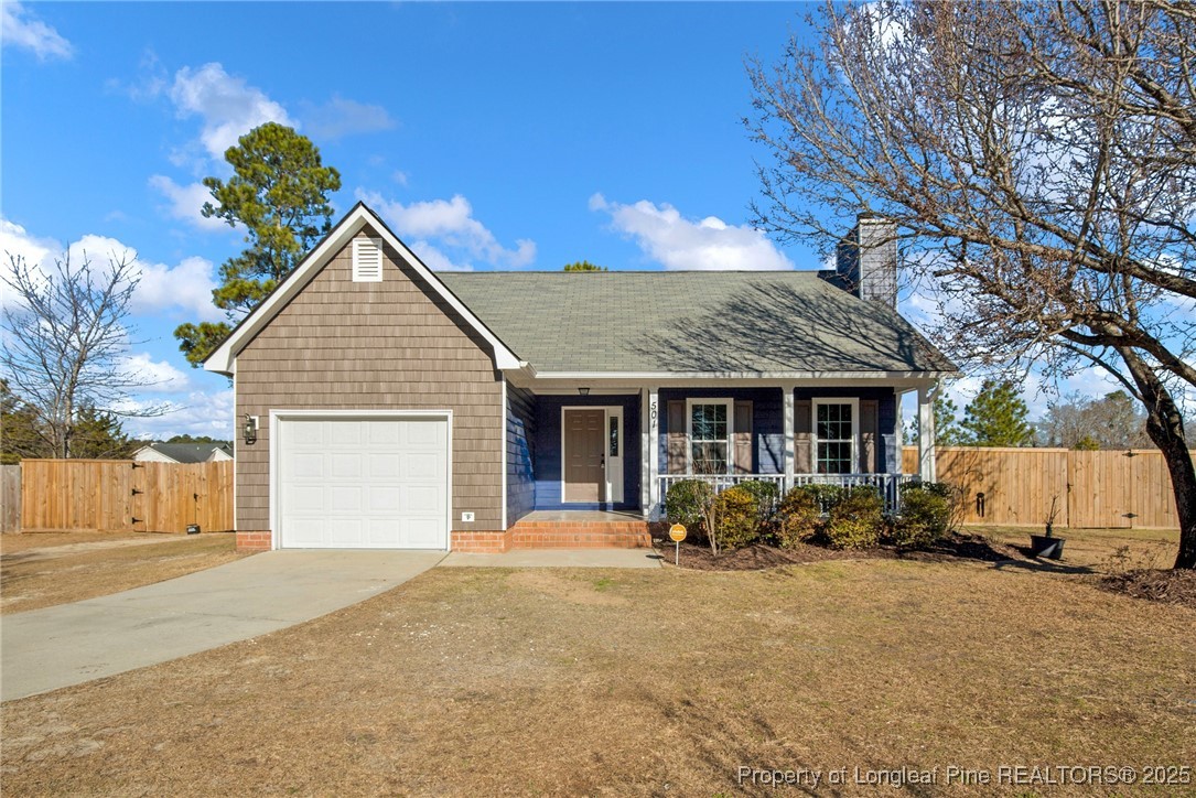 501 Camden Road Raeford, NC 28376 - Photo 1 of 35 a front view of a house with yard
