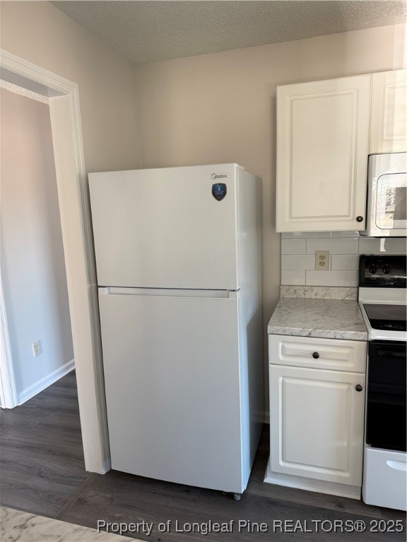 501 Camden Road Raeford, NC 28376 - Photo 13 of 35 a white refrigerator freezer sitting in a kitchen