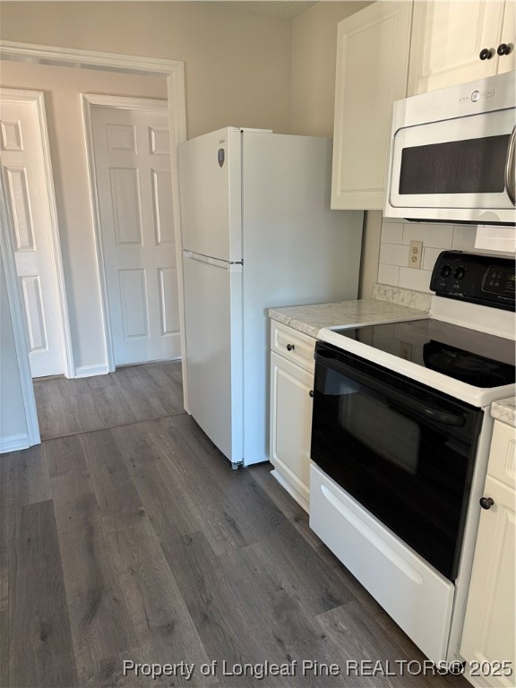501 Camden Road Raeford, NC 28376 - Photo 14 of 35 a kitchen with a stove and a refrigerator