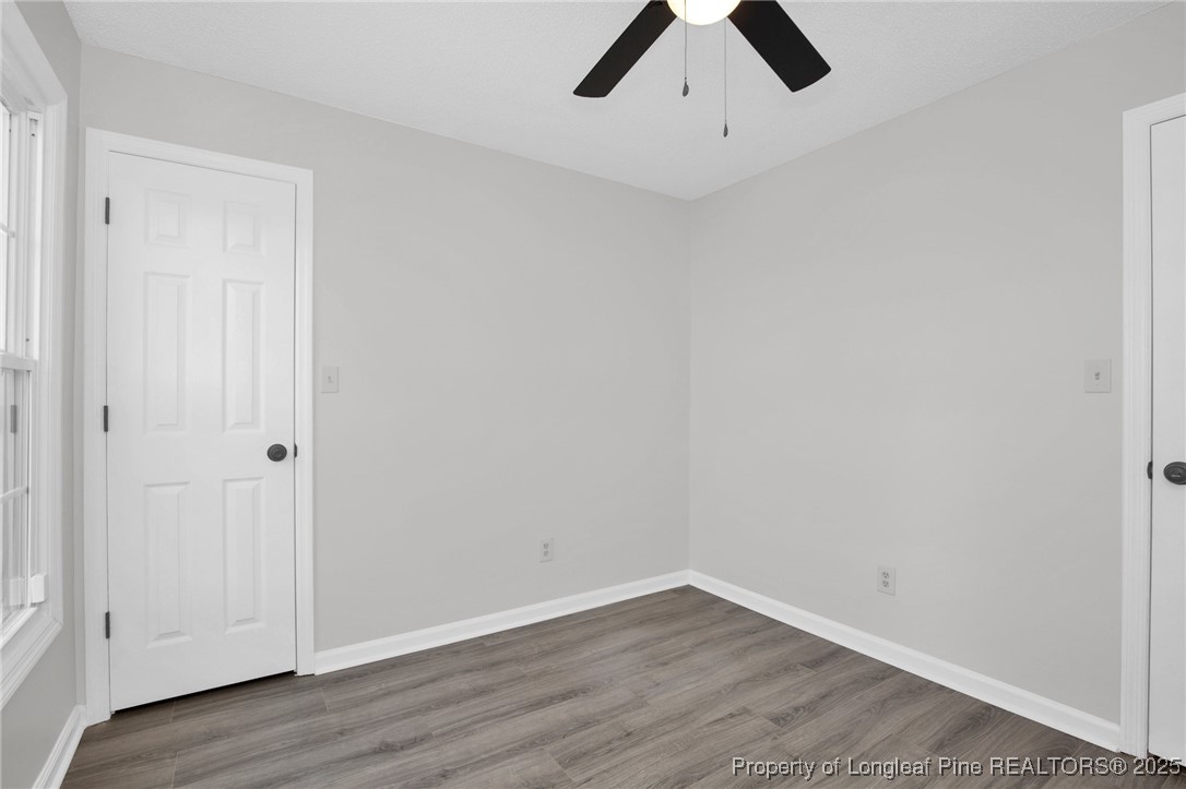 501 Camden Road Raeford, NC 28376 - Photo 19 of 35 a view of an empty room with wooden floor