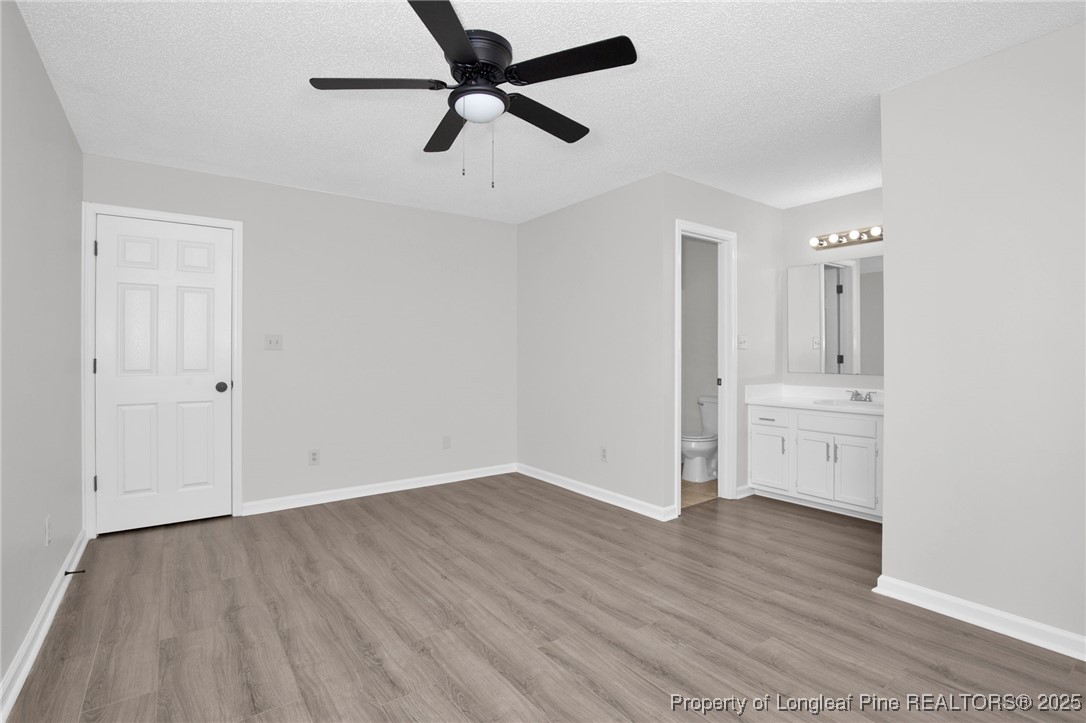 501 Camden Road Raeford, NC 28376 - Photo 24 of 35 wooden floor in an empty room with a window