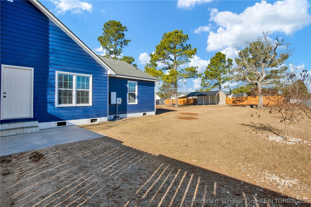 501 Camden Road Raeford, NC 28376 - Photo 30 of 35 a view of a house with a snow