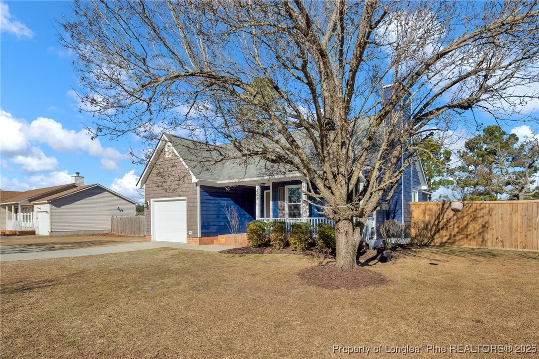 501 Camden Road Raeford, NC 28376 - Photo 3 of 35 a front view of a house with a yard