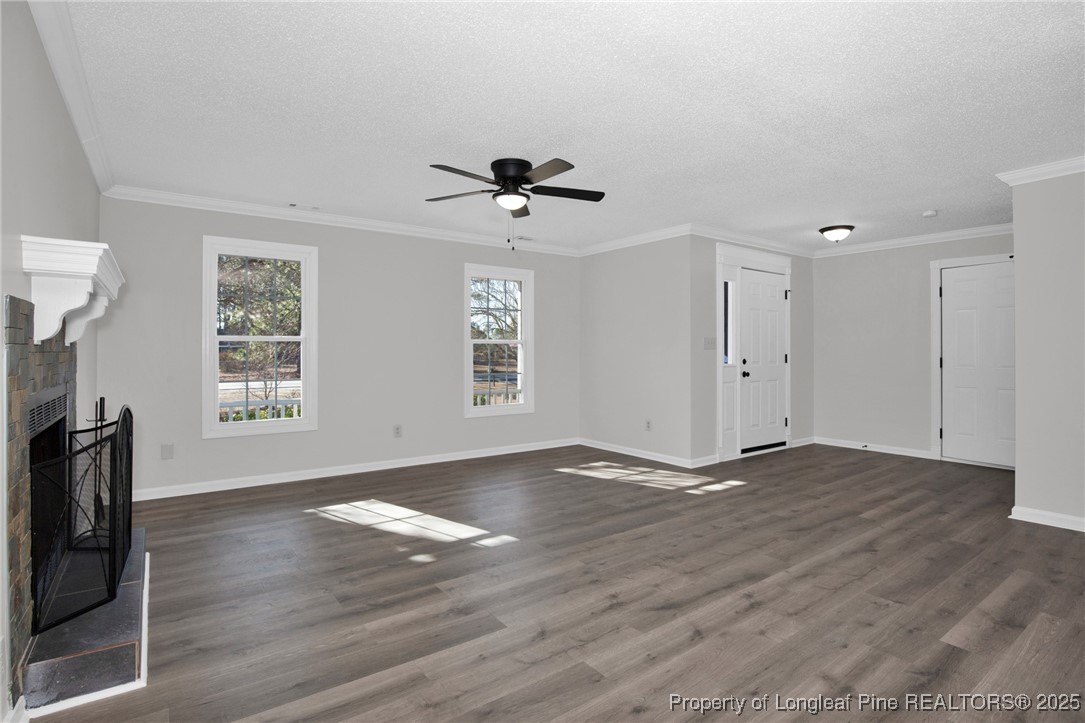501 Camden Road Raeford, NC 28376 - Photo 7 of 35 a view of an empty room with a window and wooden floor