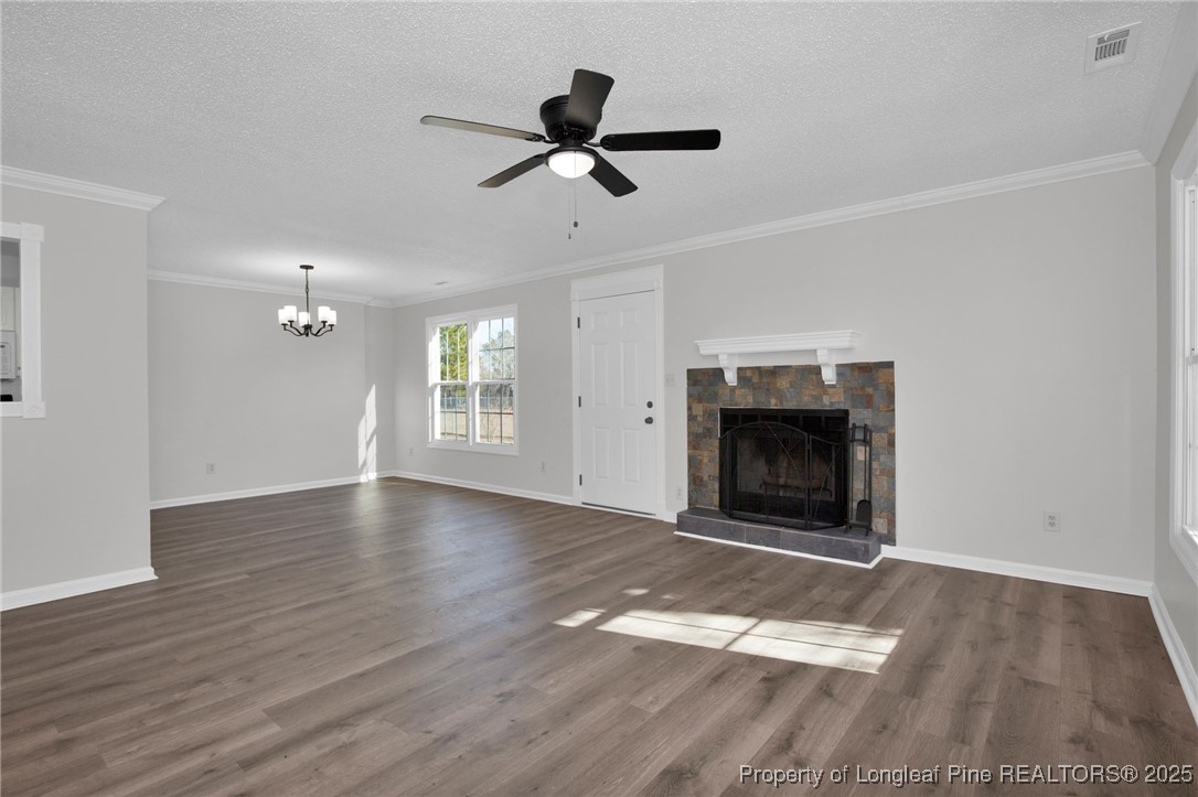 501 Camden Road Raeford, NC 28376 - Photo 9 of 35 wooden floor in an empty room with a fireplace