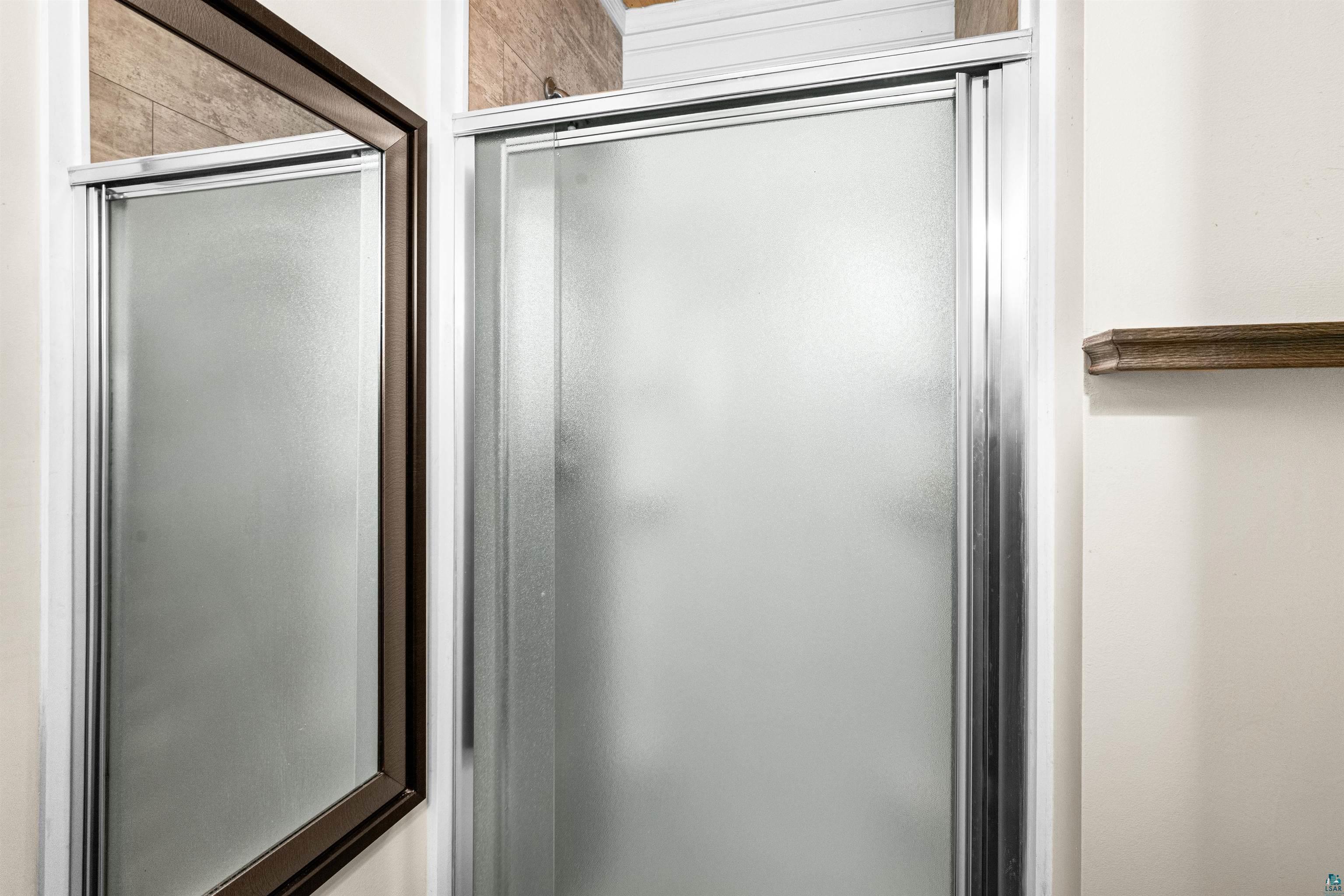 3325 Strand Road Duluth, MN 55803 - Photo 17 of 25 Frosted glass shower enclosure.