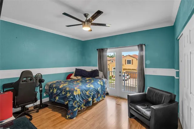 a bedroom with a bed and furniture