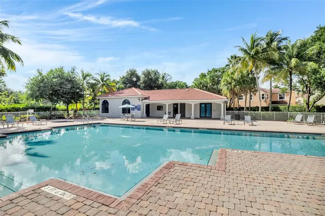 a house with river in front of it