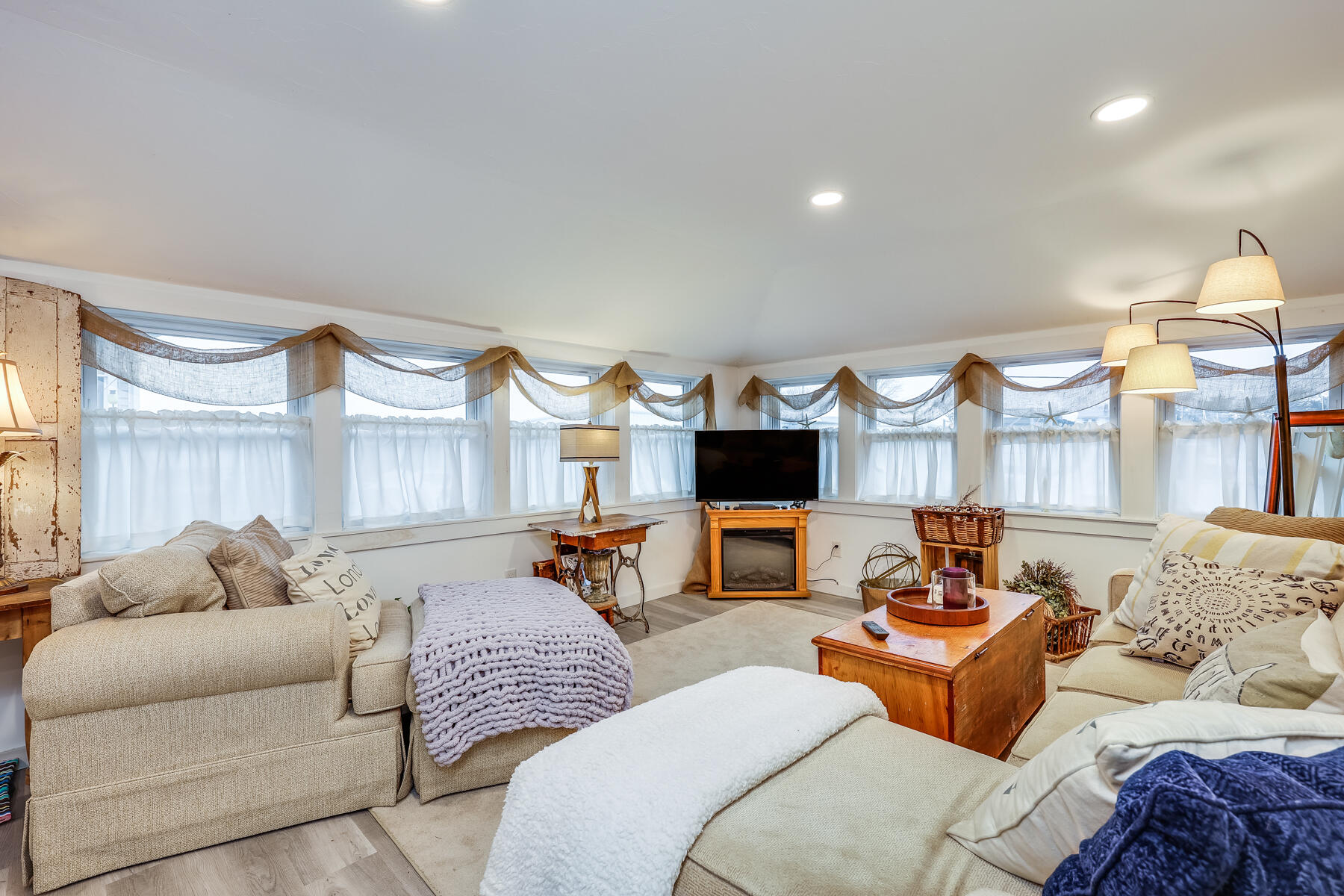 8 Green Street Buzzards Bay, MA 02532 - Photo 1 of 50 a living room with furniture and a flat screen tv