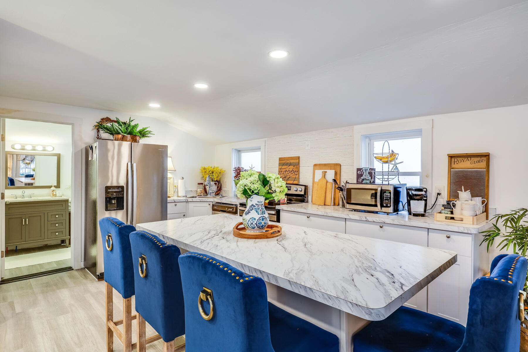 8 Green Street Buzzards Bay, MA 02532 - Photo 12 of 50 a dining hall with granite countertop a refrigerator dining table and chairs