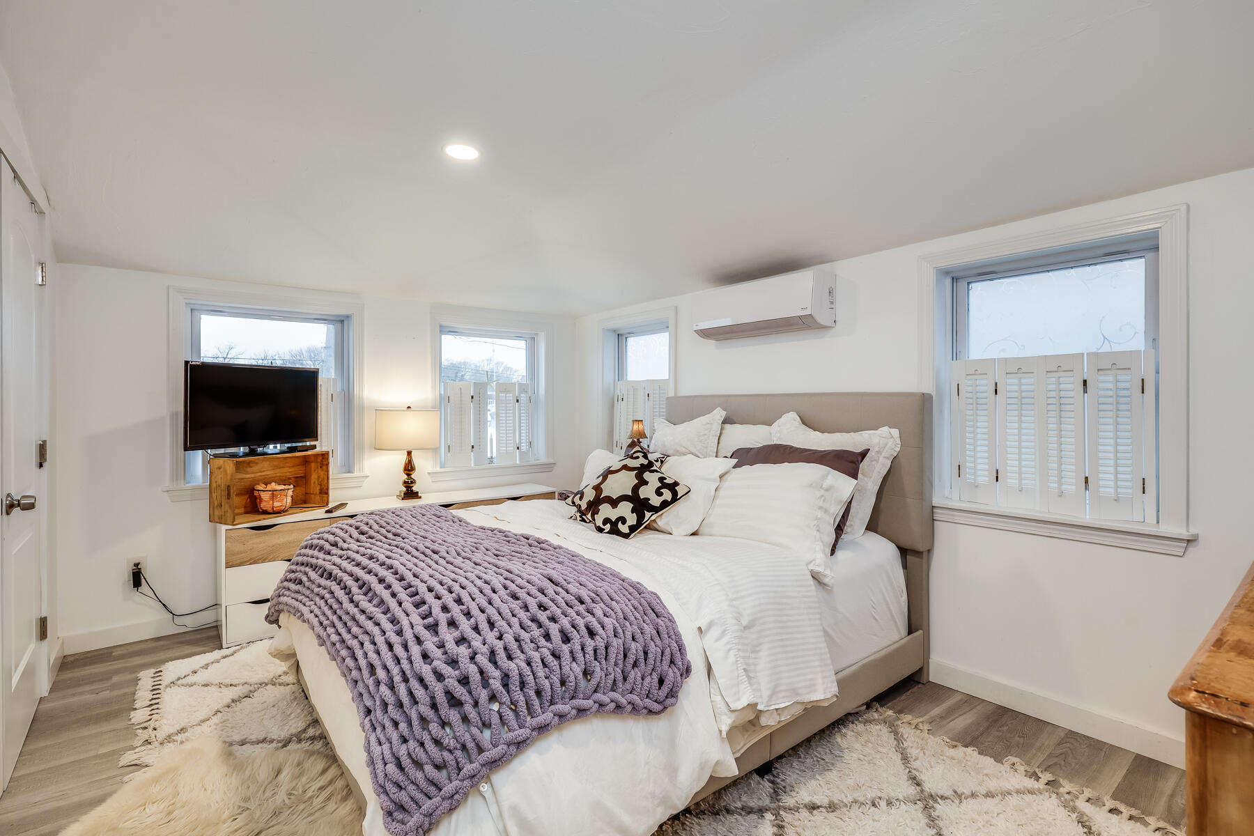 8 Green Street Buzzards Bay, MA 02532 - Photo 21 of 50 a bedroom with double bed and a flat screen tv