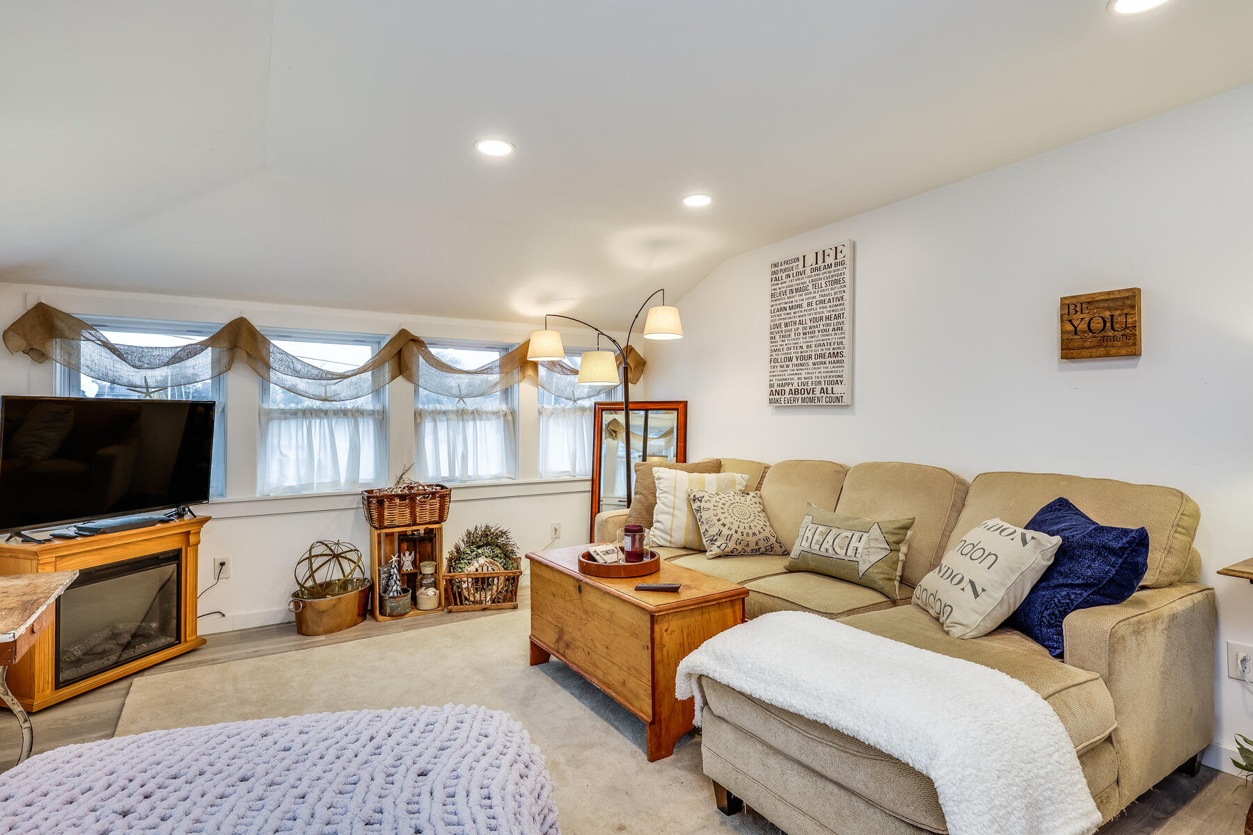 8 Green Street Buzzards Bay, MA 02532 - Photo 7 of 50 a living room with furniture and a flat screen tv