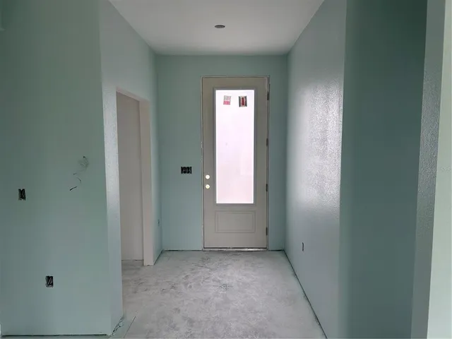 a view of an empty room with window