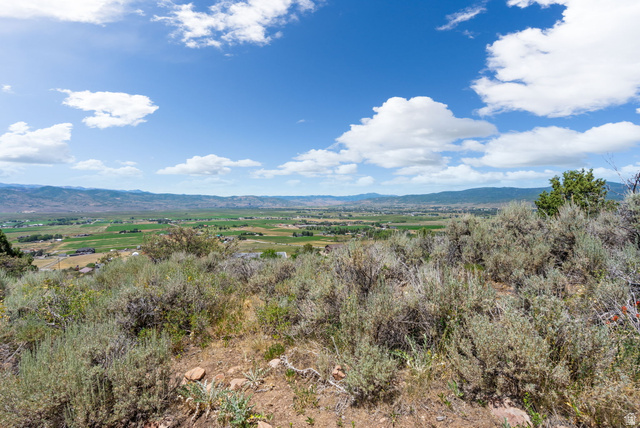 2459 Painter Road Marion, UT 84036 - Photo 18 of 42 Expansive valley scenery featuring distant mountains and cultivated fields