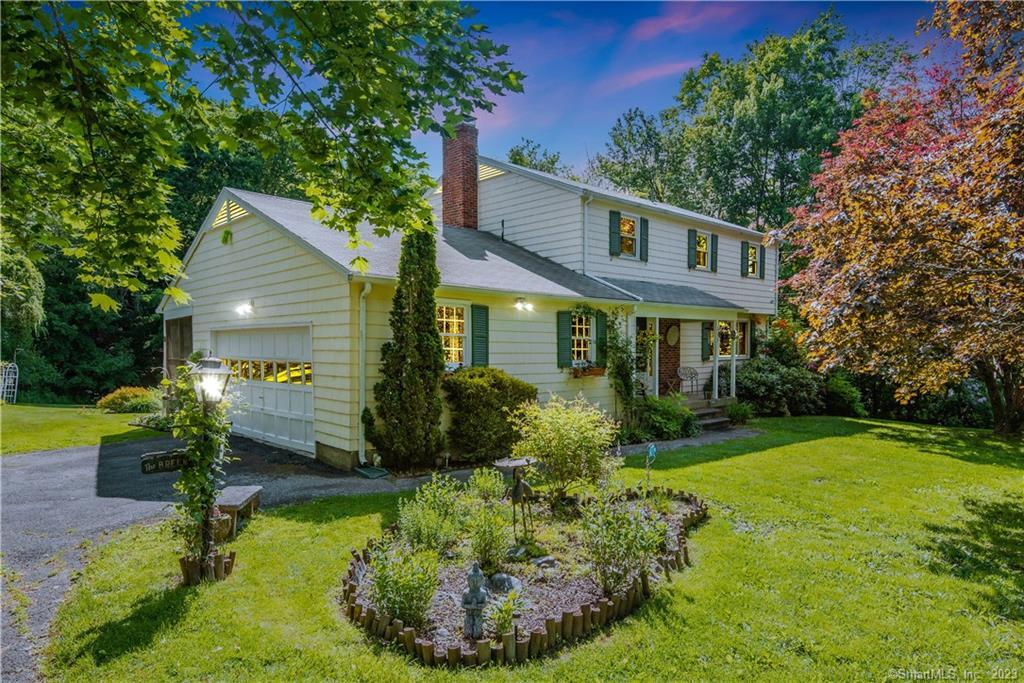 235 Babbitt Road Thomaston, CT 06787 - Photo 1 of 1 a front view of a house with garden