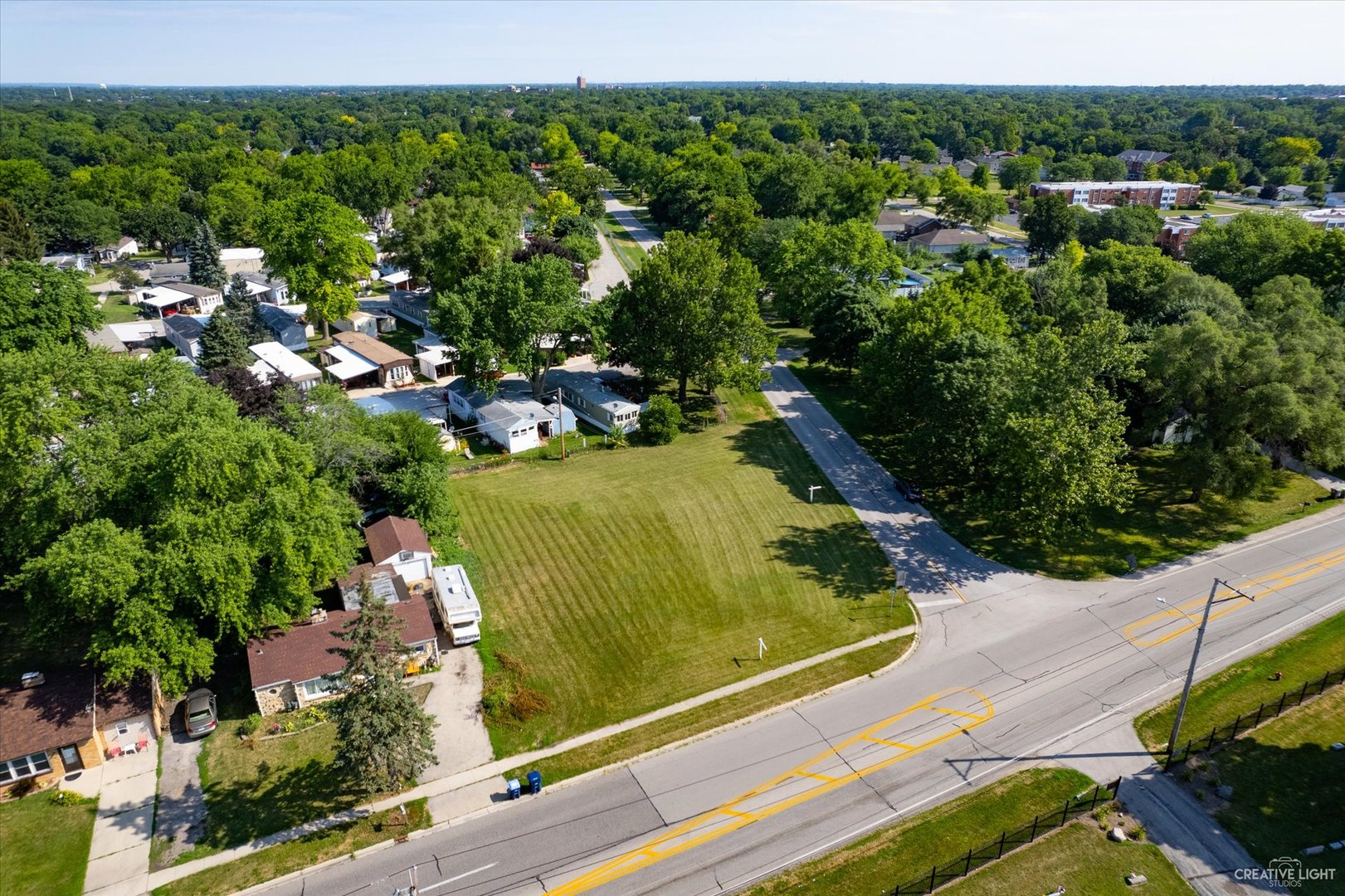 Lot Montgomery Montgomery Road Montgomery, IL 60538 - Photo 7 of 9 a view of a yard with potted plants