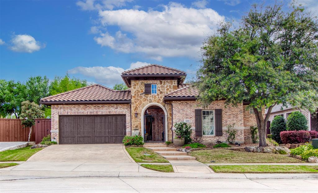 690 Flagstone Drive Irving, TX 75039 - Photo 1 of 1 a front view of a house with garden