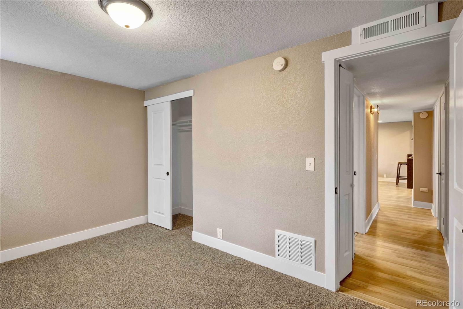 154 South Stuart Street Denver, CO 80219 - Photo 22 of 26 a view of livingroom with hardwood floor