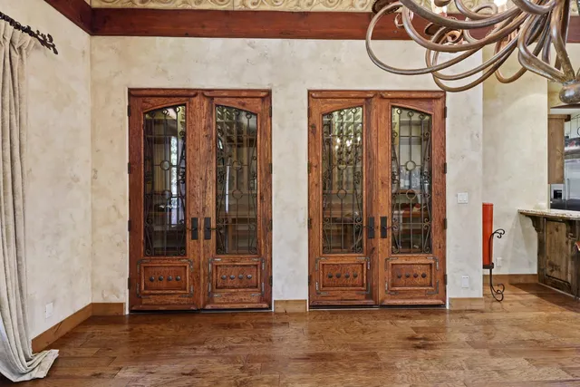 a kitchen with stainless steel appliances granite countertop a sink and cabinets