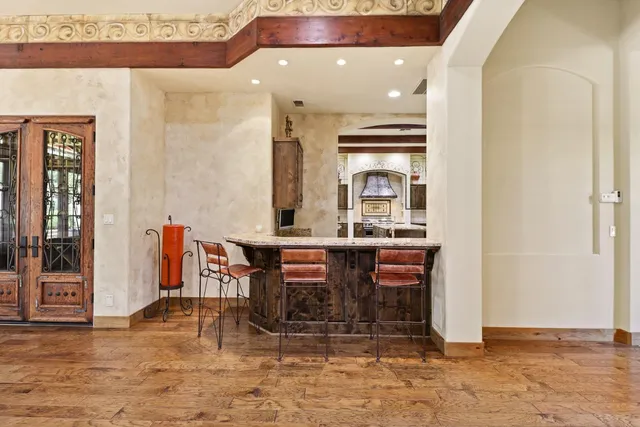 a kitchen with a stove and a microwave