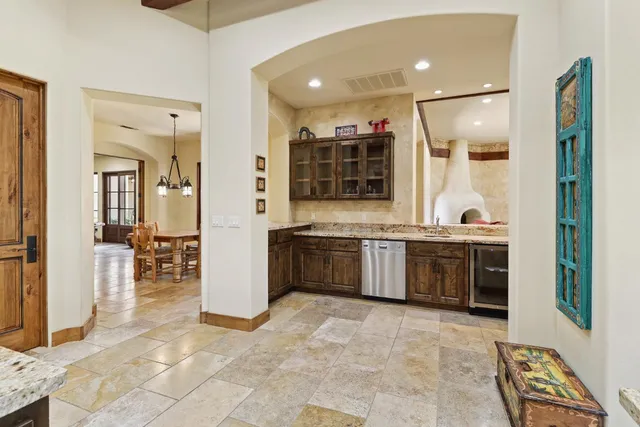 a view of a kitchen cabinets and a wooden floor