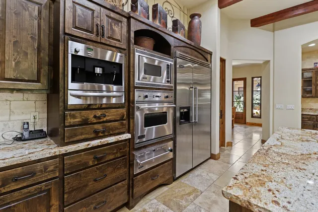a view of swimming pool with seating area