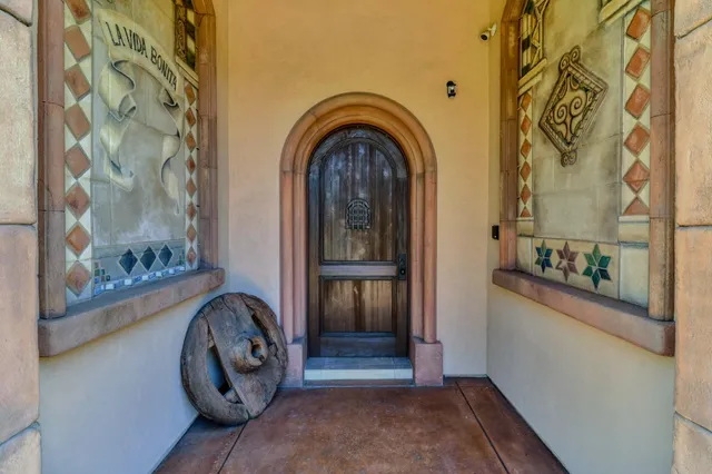 a bathroom with a mirror and a shower
