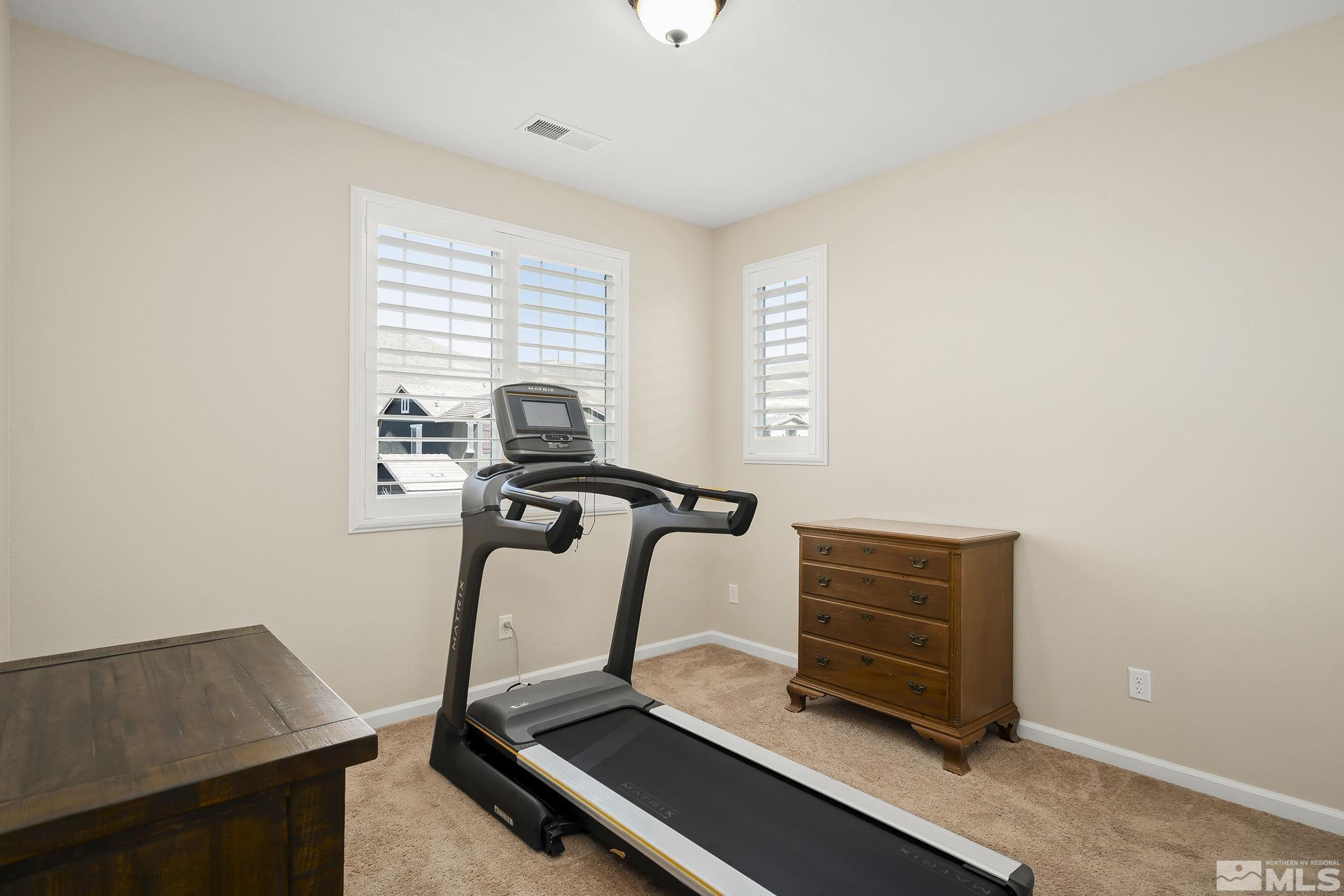 2860 Bonfire Lane Reno, NV 89521 - Photo 17 of 25 a room with gym equipment