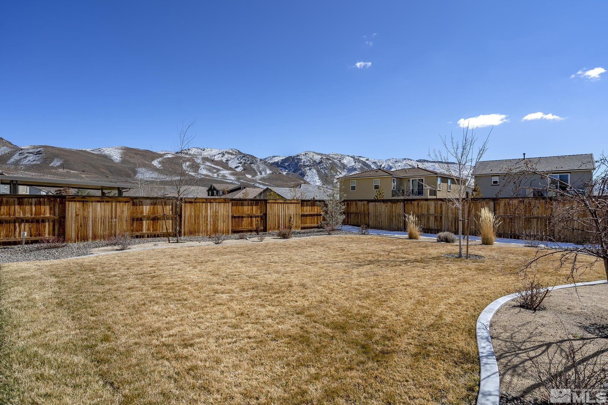 2860 Bonfire Lane Reno, NV 89521 - Photo 23 of 25 a house with trees in the background