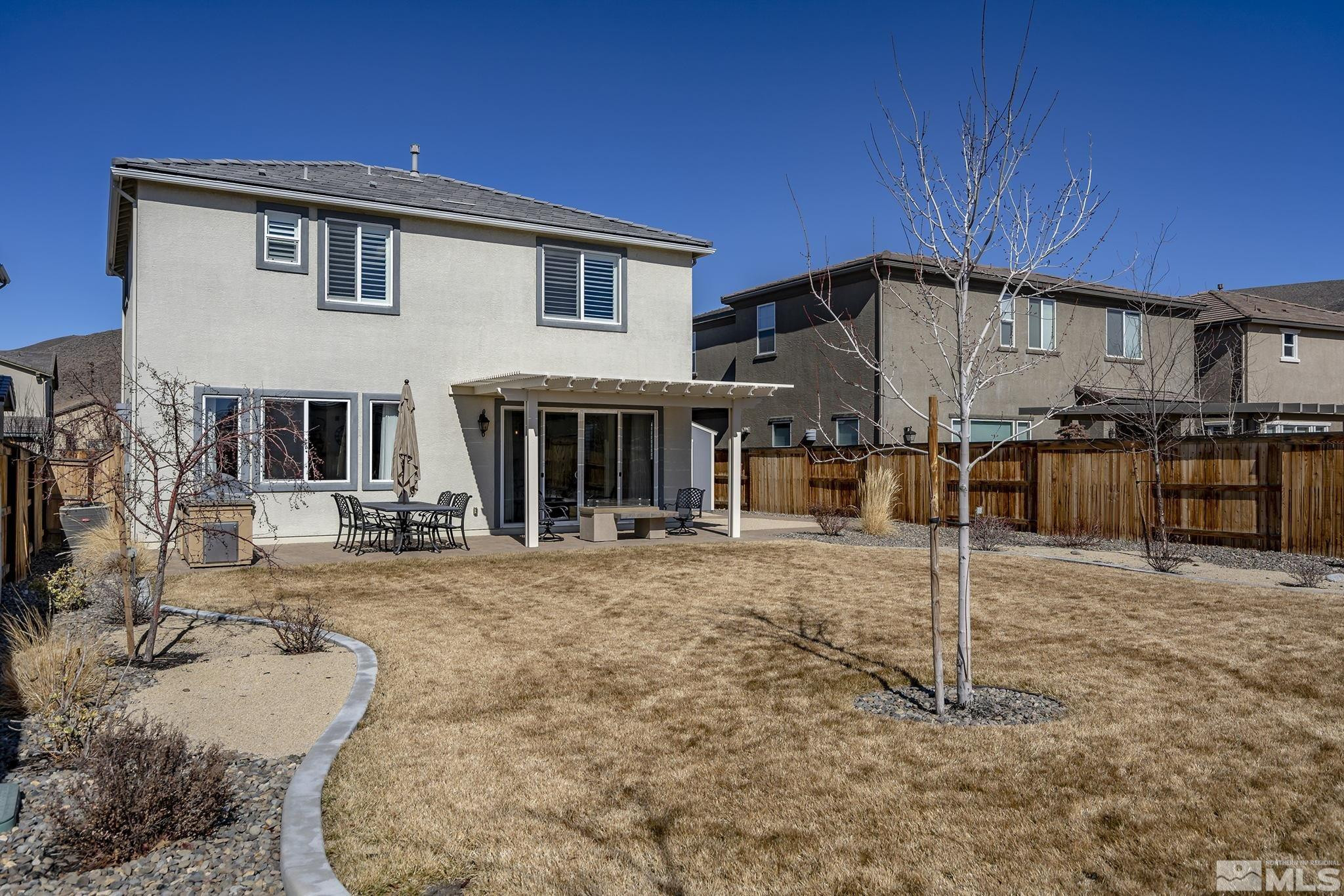 2860 Bonfire Lane Reno, NV 89521 - Photo 25 of 25 a view of a house with backyard