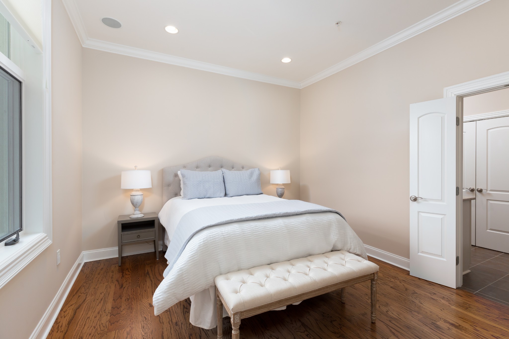 2411 Crestmoor Road, Unit PH4 Nashville, TN 37215 - Photo 16 of 39 a bedroom with a bed and wooden floor