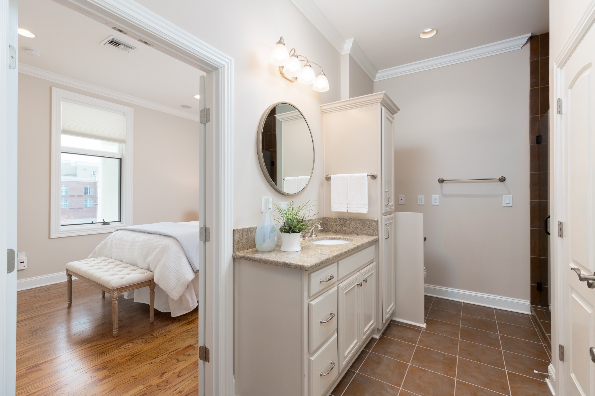 2411 Crestmoor Road, Unit PH4 Nashville, TN 37215 - Photo 18 of 39 a bathroom with a double vanity sink and a mirror
