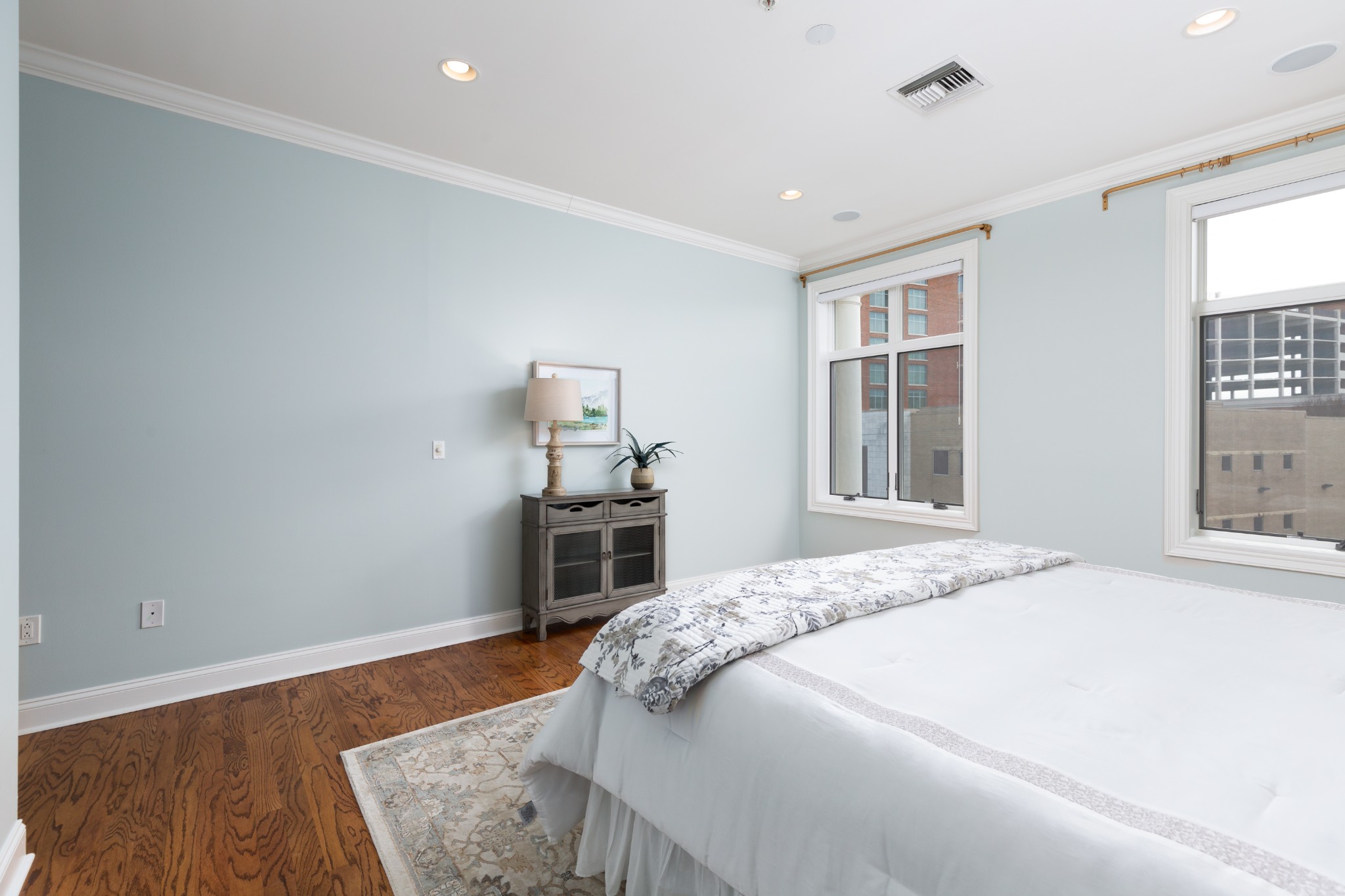 2411 Crestmoor Road, Unit PH4 Nashville, TN 37215 - Photo 21 of 39 a bedroom with a bed and wooden floor