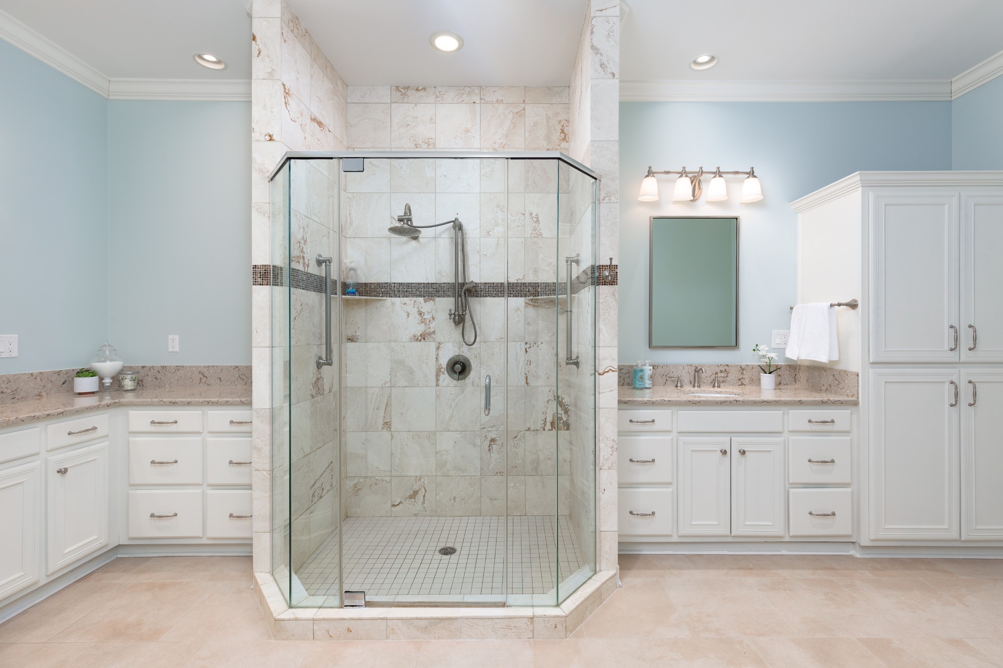 2411 Crestmoor Road, Unit PH4 Nashville, TN 37215 - Photo 22 of 39 a bathroom with a shower sink and mirror