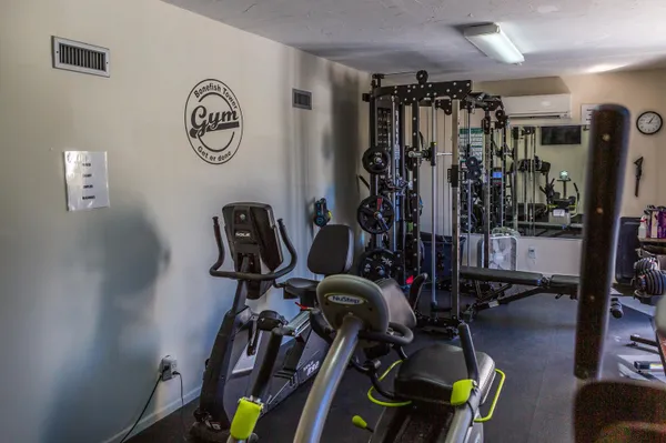 a view of a room with gym equipment