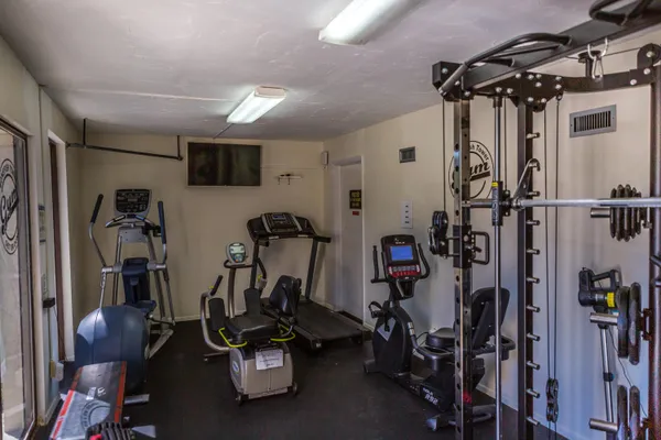 a view of a room with gym equipment