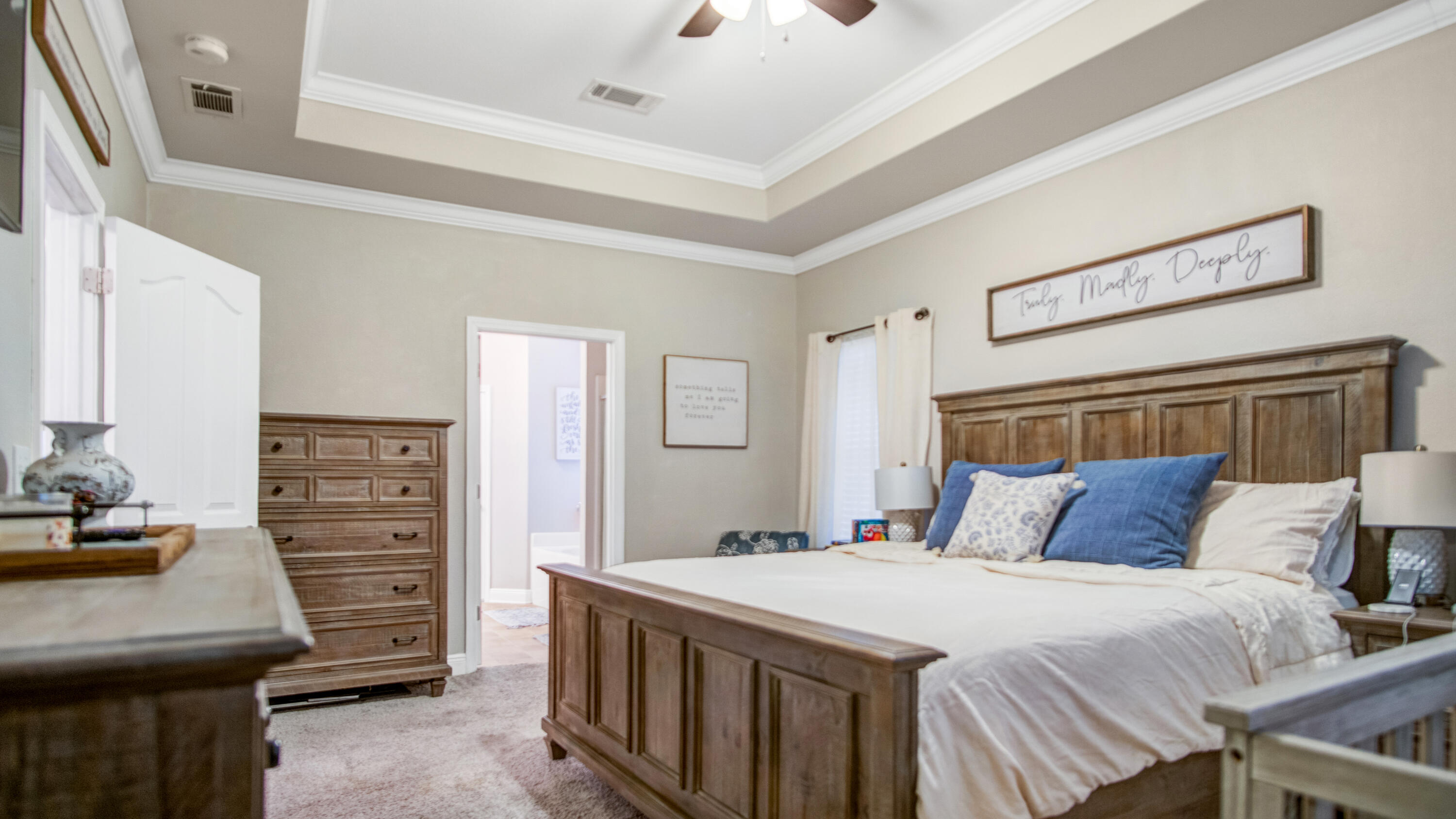 744 Lime Lane Crestview, FL 32536 - Photo 15 of 33 a bedroom with a bed and furniture