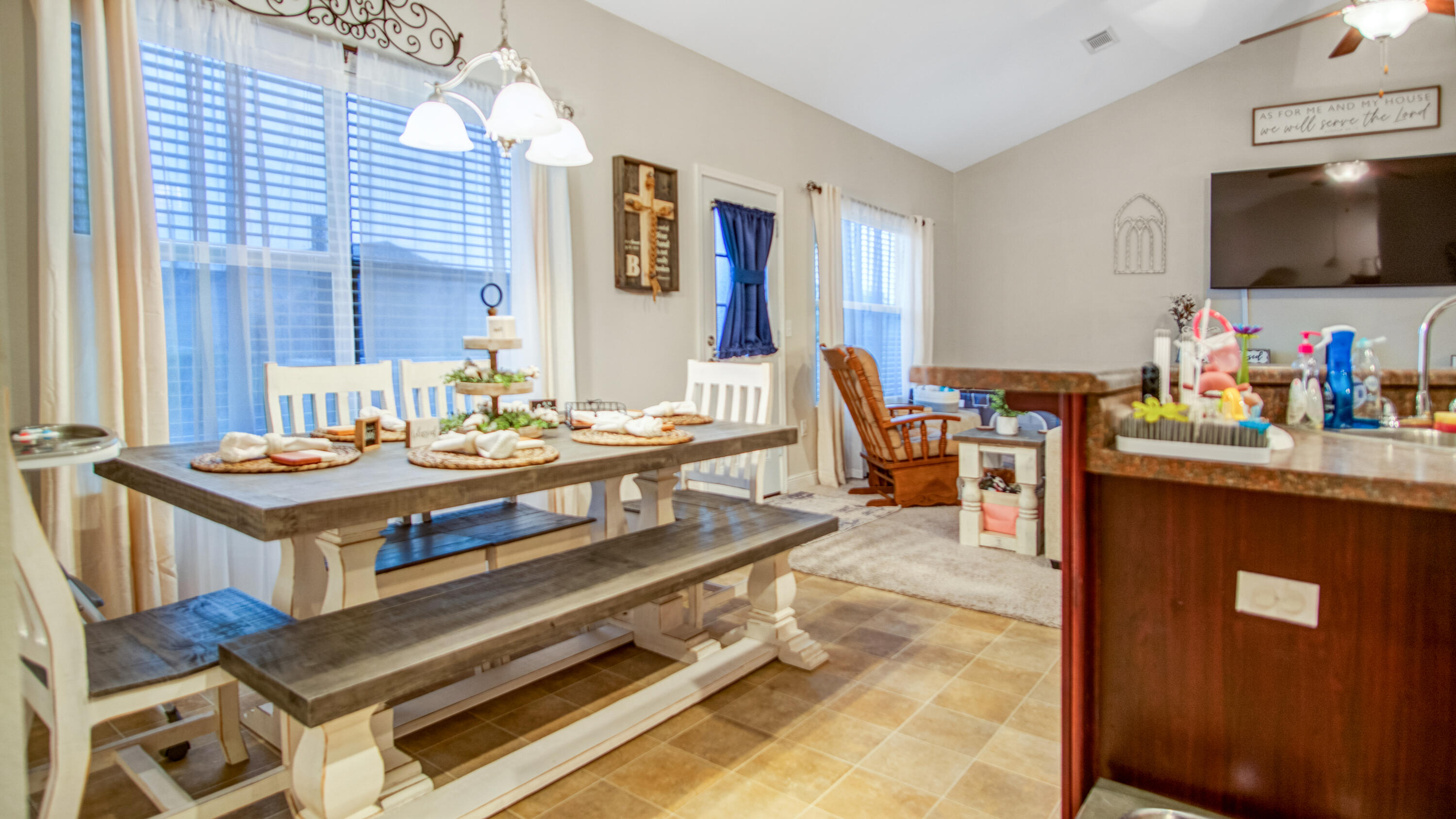 744 Lime Lane Crestview, FL 32536 - Photo 23 of 33 a living room with furniture and a flat screen tv