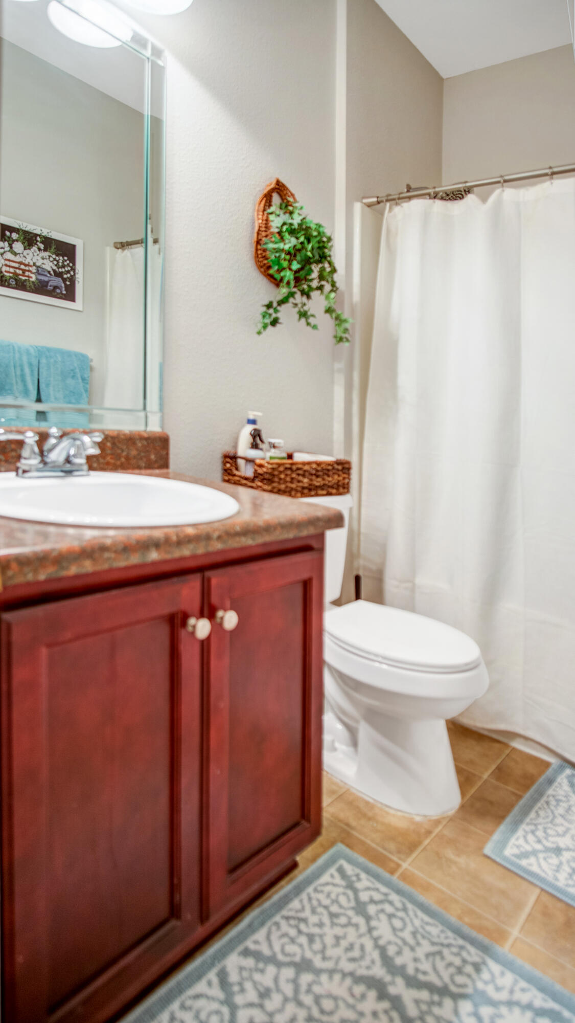 744 Lime Lane Crestview, FL 32536 - Photo 25 of 33 a bathroom with a sink toilet and shower