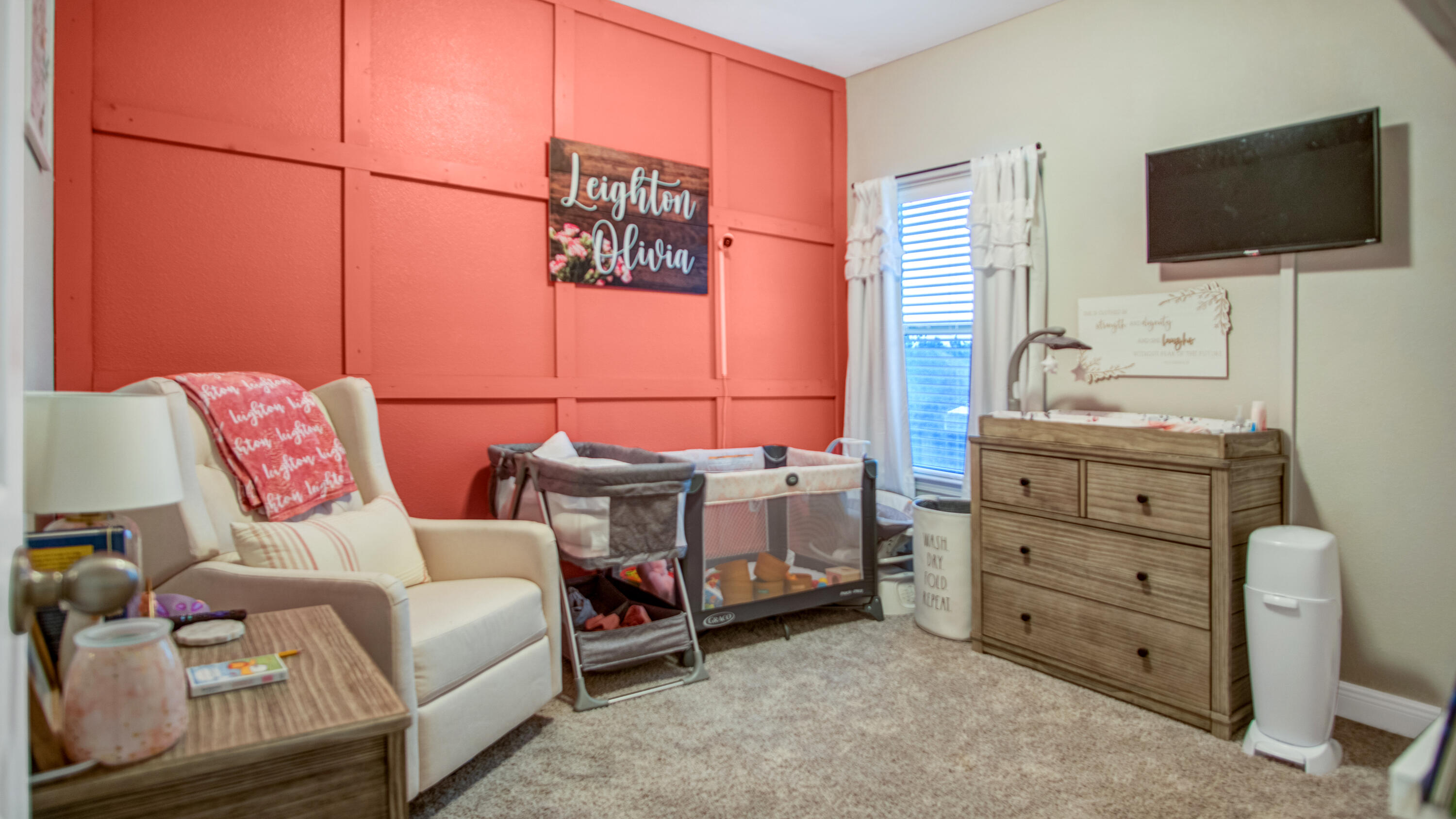744 Lime Lane Crestview, FL 32536 - Photo 26 of 33 a bedroom with furniture and a flat screen tv
