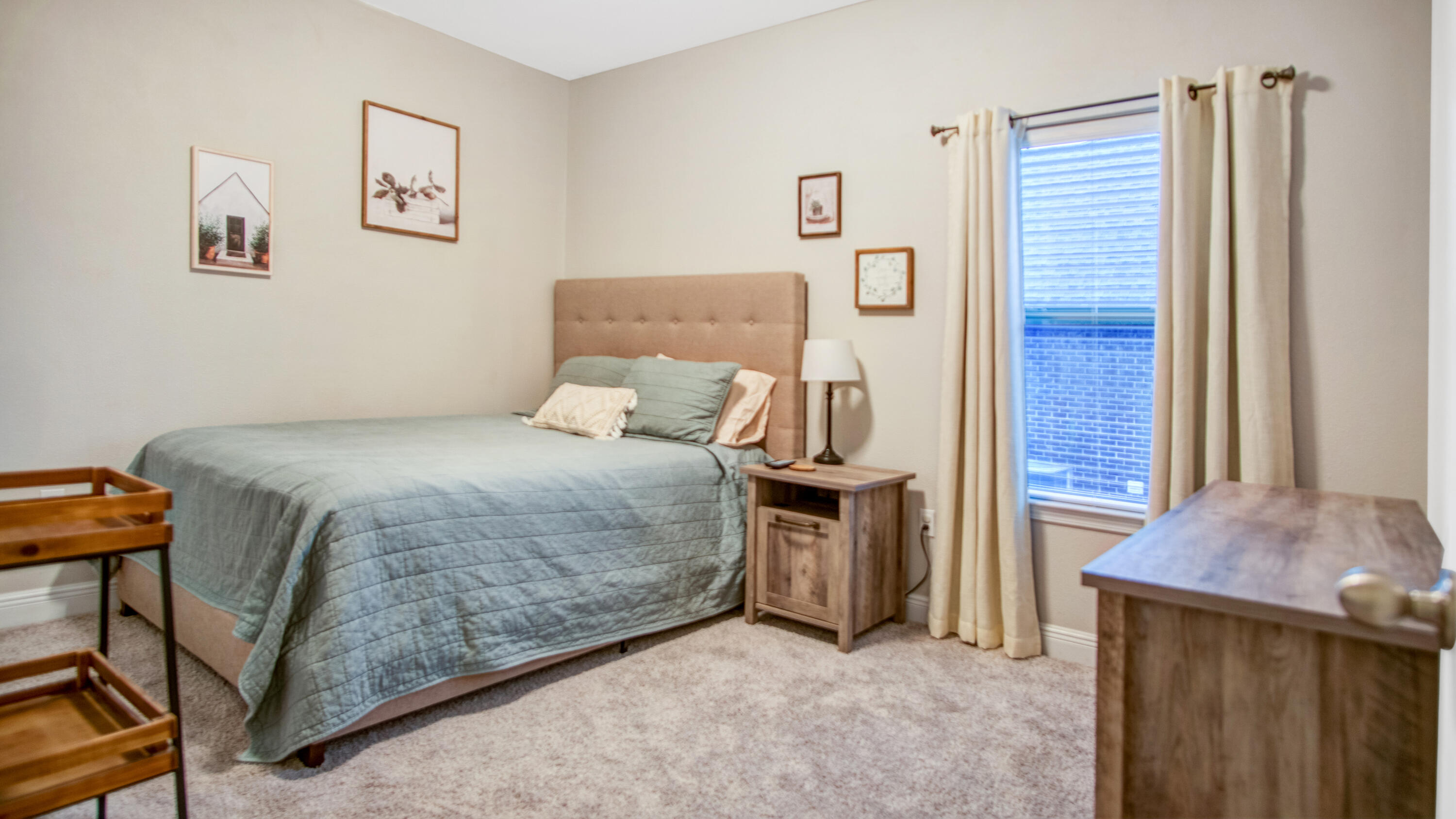 744 Lime Lane Crestview, FL 32536 - Photo 27 of 33 a bedroom with a bed and a cabinets