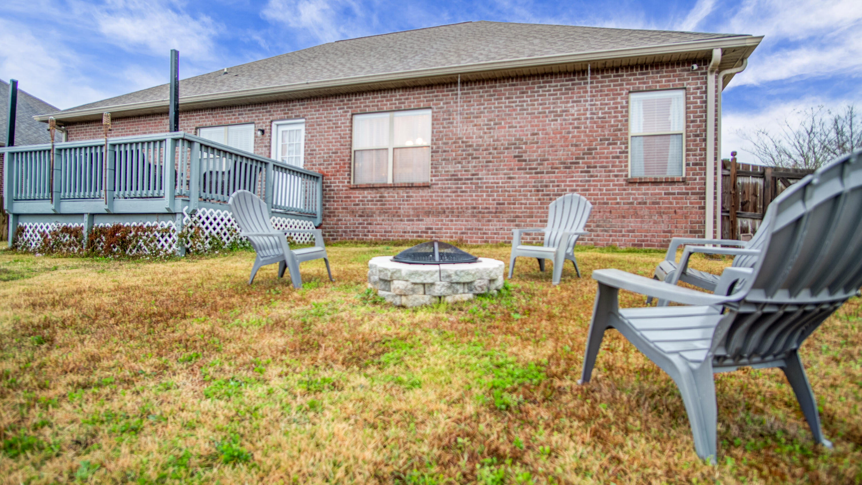 744 Lime Lane Crestview, FL 32536 - Photo 32 of 33 a backyard of a house with table and chairs