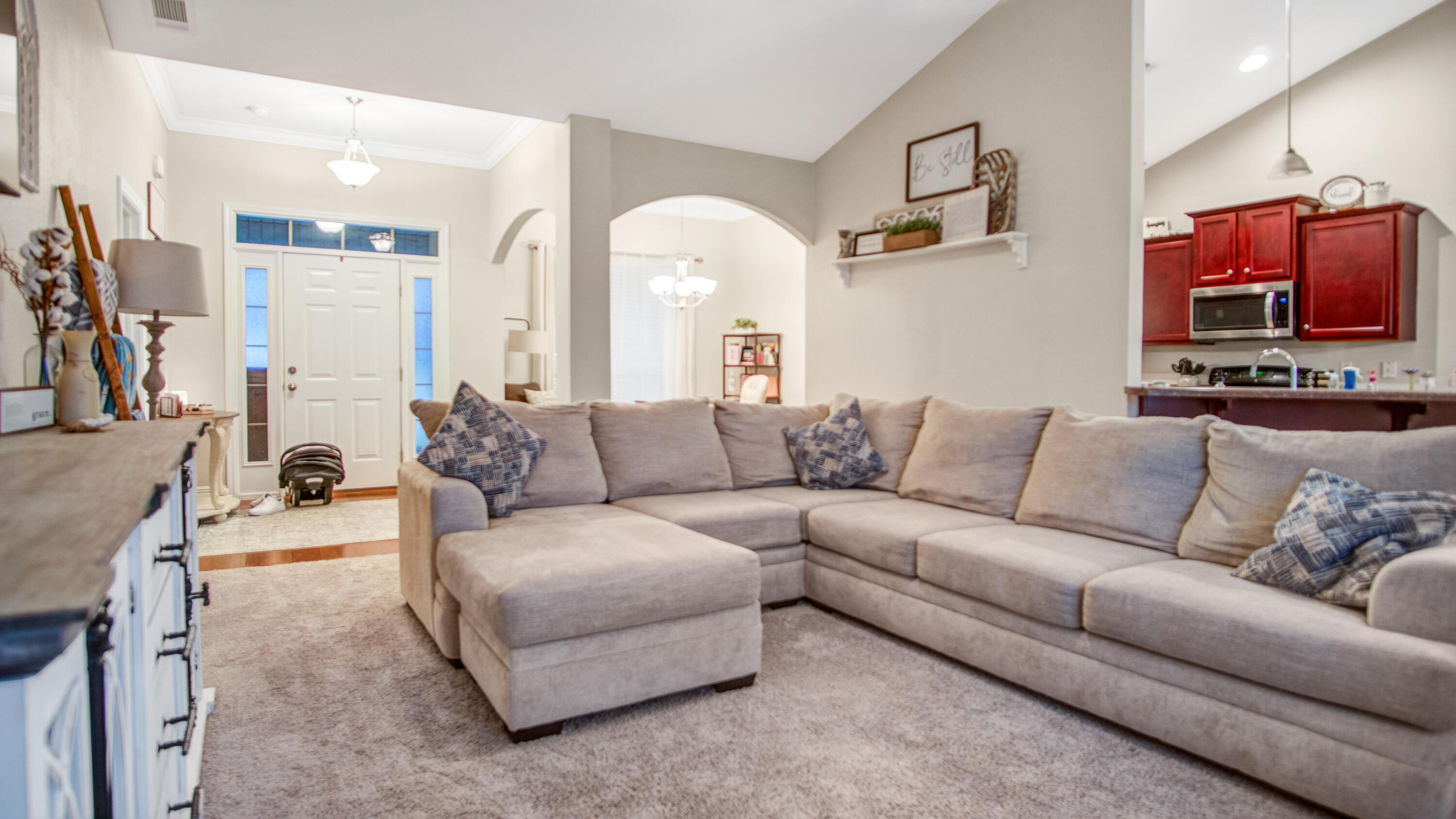 744 Lime Lane Crestview, FL 32536 - Photo 6 of 33 a living room with furniture and a flat screen tv